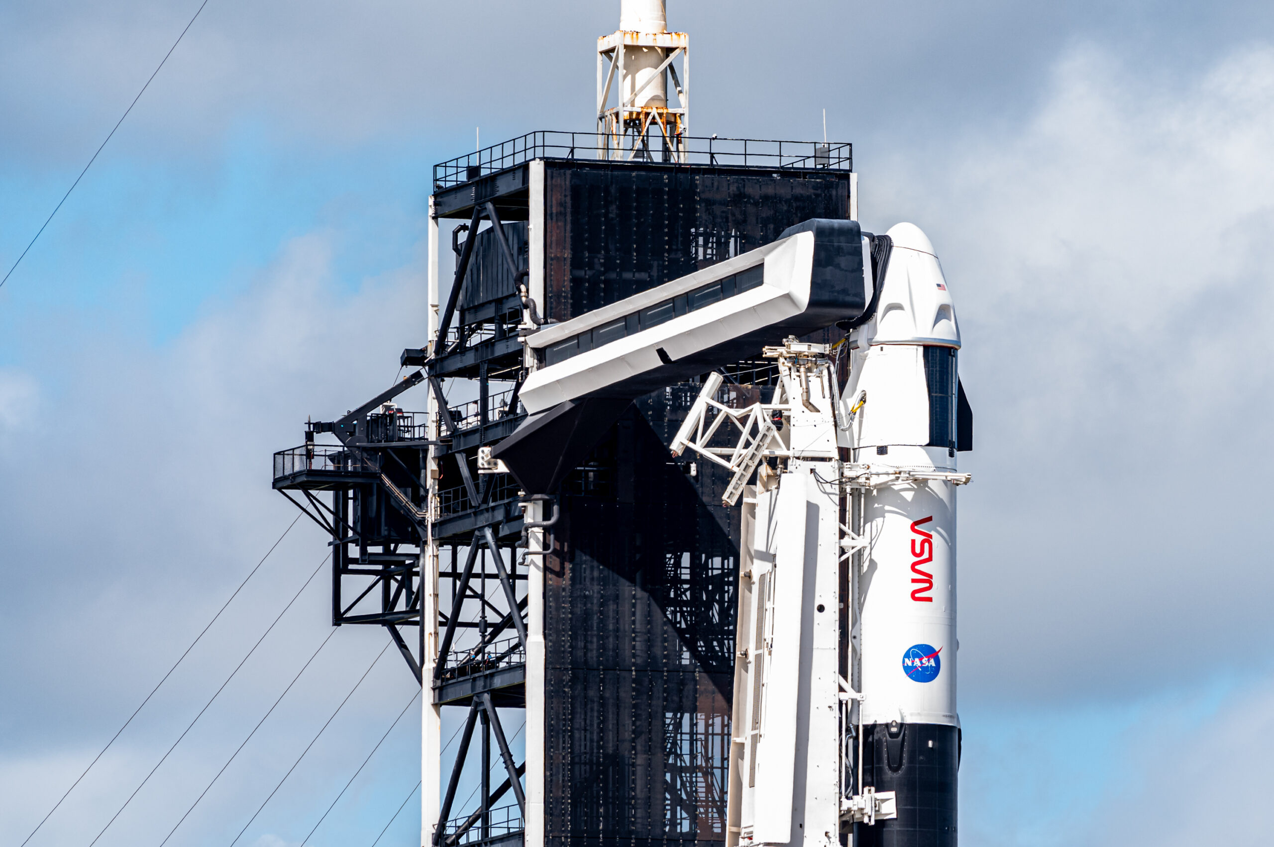 The upper-third of Falcon 9 with Endurance and the Crew Access Structure at LC-39A